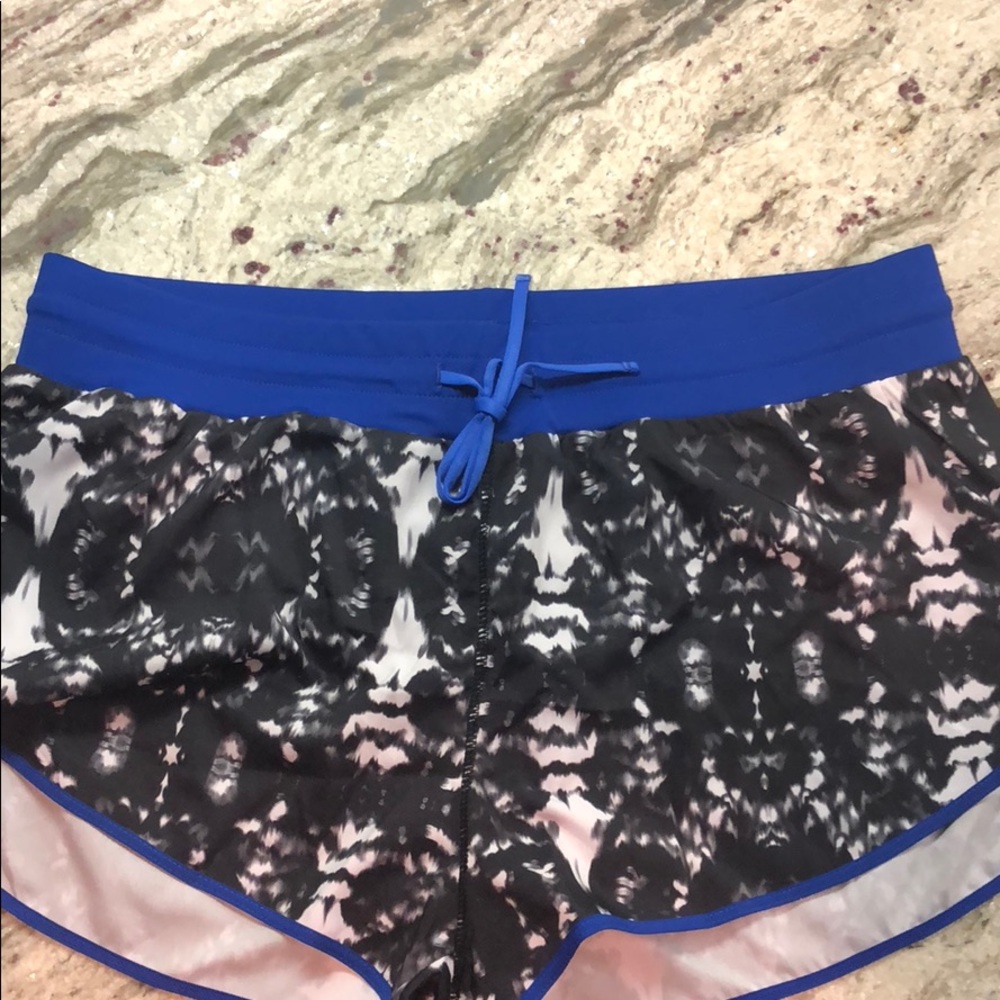 Vibrant royal blue, black and white running shorts
